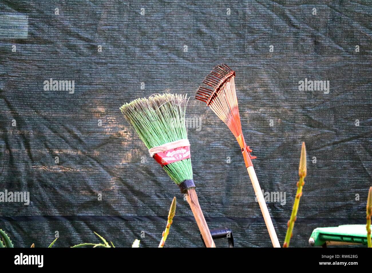 Cleaning equipment, broom, rake Stock Photo - Alamy