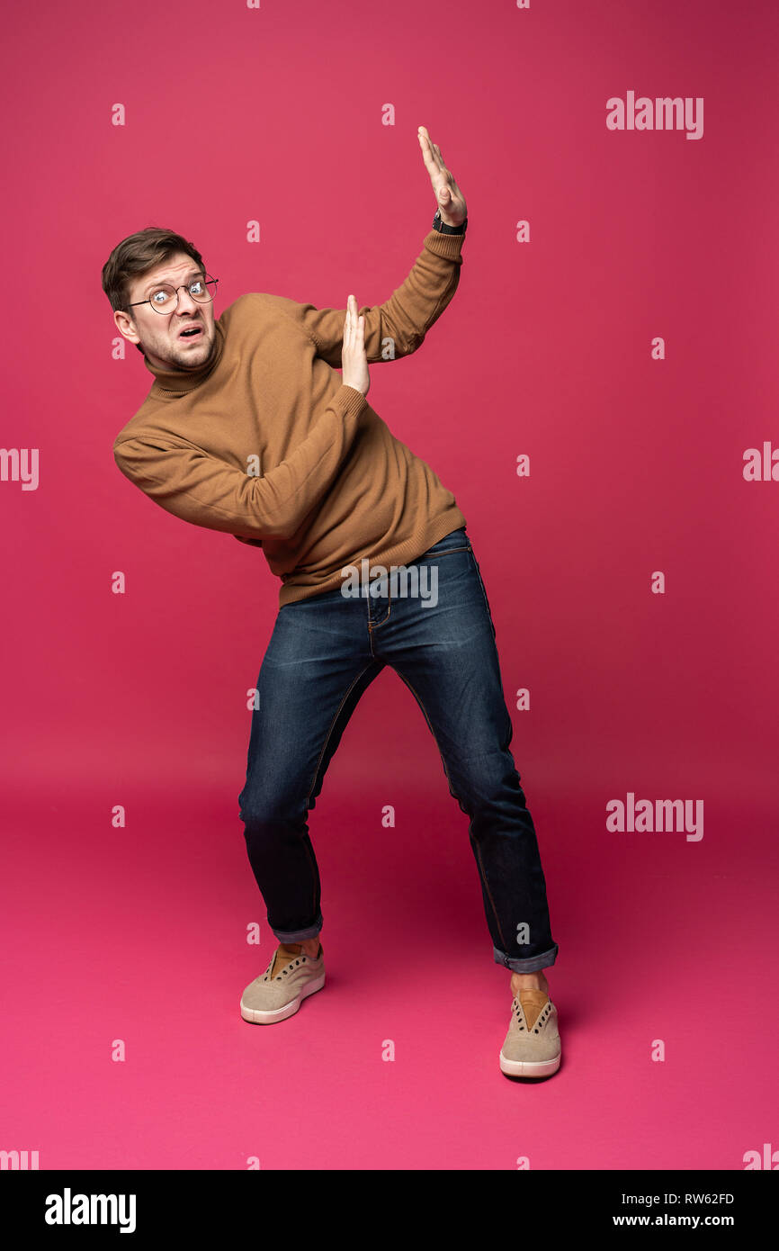 Scared pose hi-res stock photography and images - Alamy