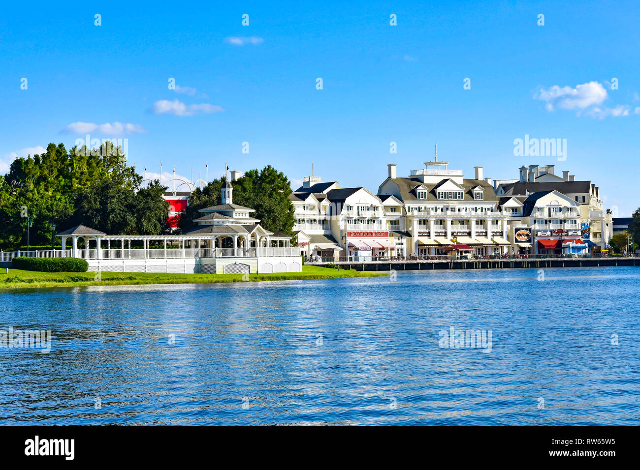 Orlando, Florida. February 09, 2019 . Panoramic view of lovely Victorian ride on dockside and restaurants at Lake Buena Vista area. Stock Photo