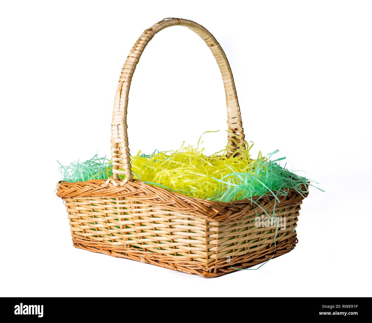 Wicker woven Easter basket isolated on white Stock Photo