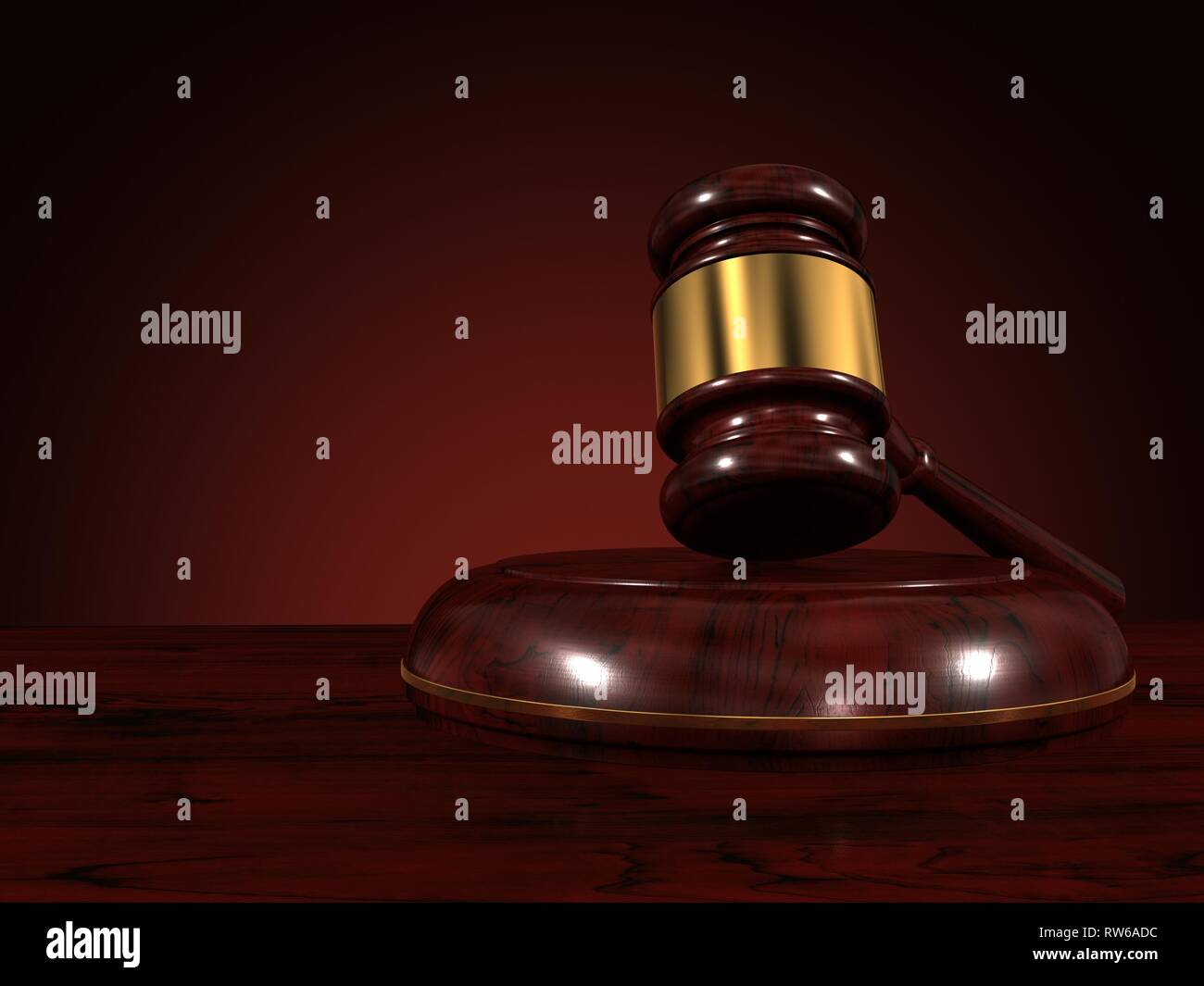 Judge gavel isolated on brown background. Stock Photo