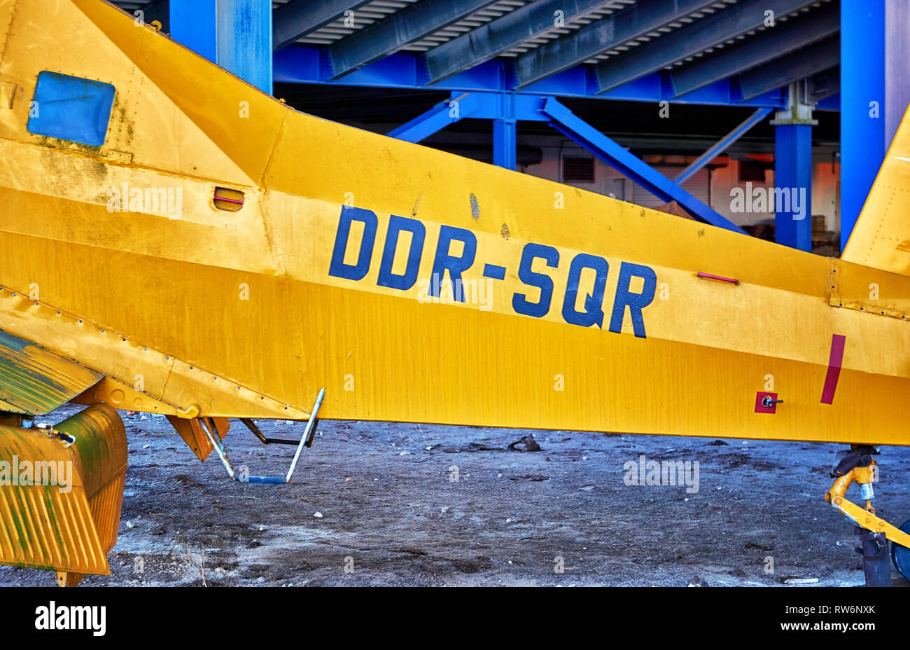 Agricultural plane in yellow. Letters with DDR-SQR means GDR-SQR. Stock Photo