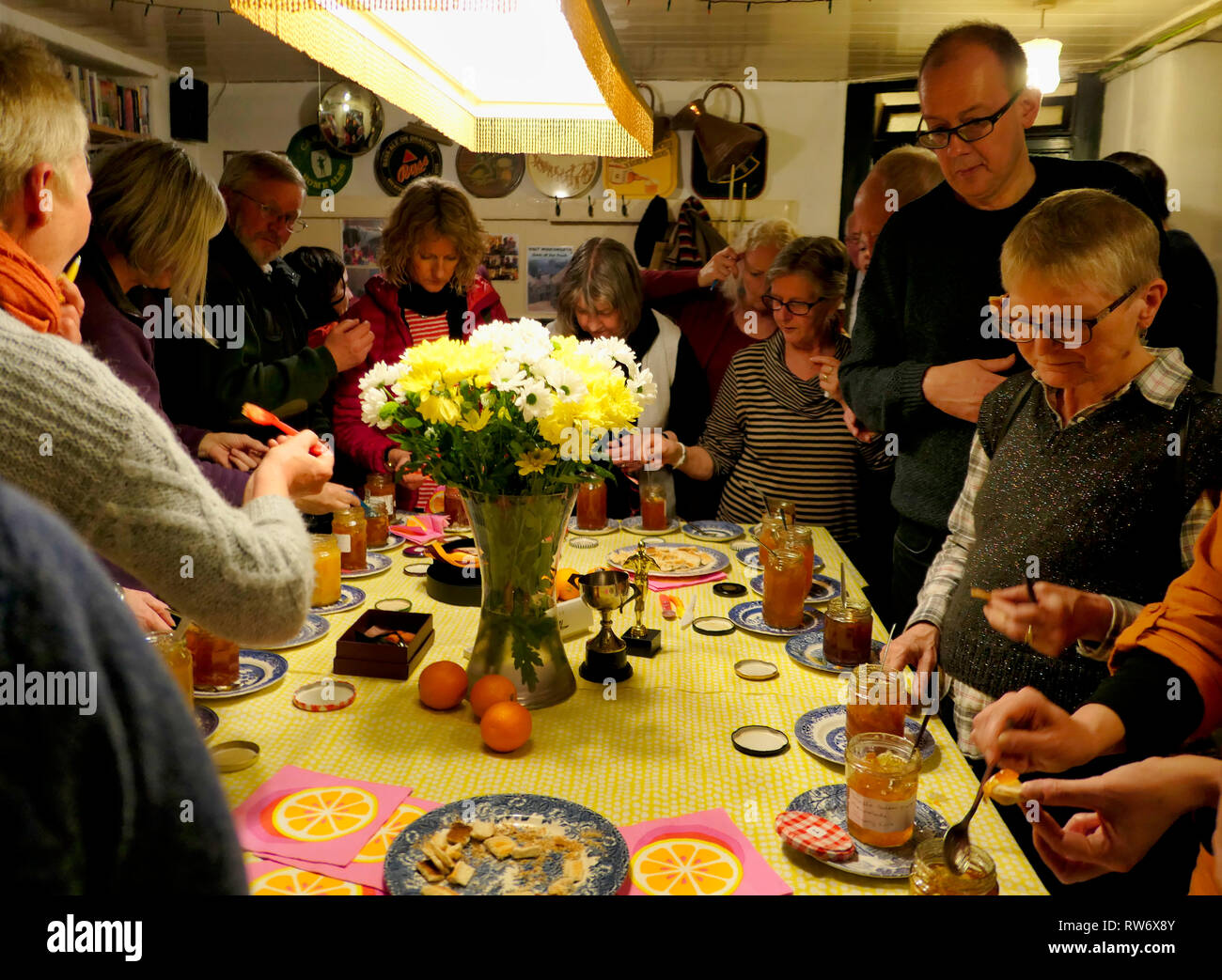 International Marmalade Festival, The Royal Oak Public House, Wirksworth, Derbyshire Dales, UK. 4th March, 2019. Participants bring & get stuck in tasting traditional homemade Seville and also other variants before voting on their favourite. Credit: Doug Blane/Alamy Live News Stock Photo