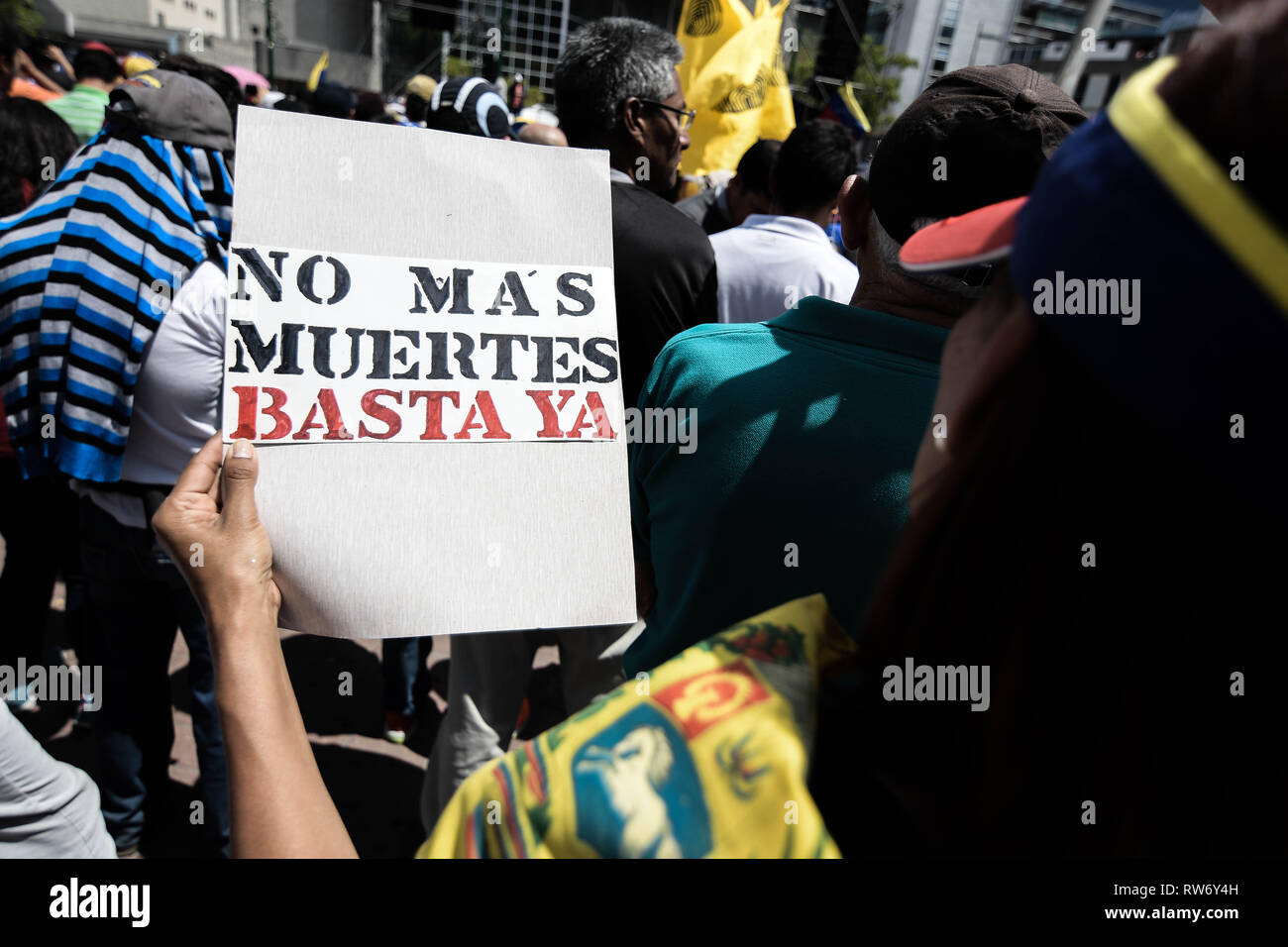 A woman seen holding a placard during a rally in support of Juan Guaido. Juan Guaido, the Venezuelan opposition leader, where many nations have recognized as the legitimate interim president of Venezuela, greets his supporters during a rally against the government of President Nicolas Maduro in Caracas. Stock Photo