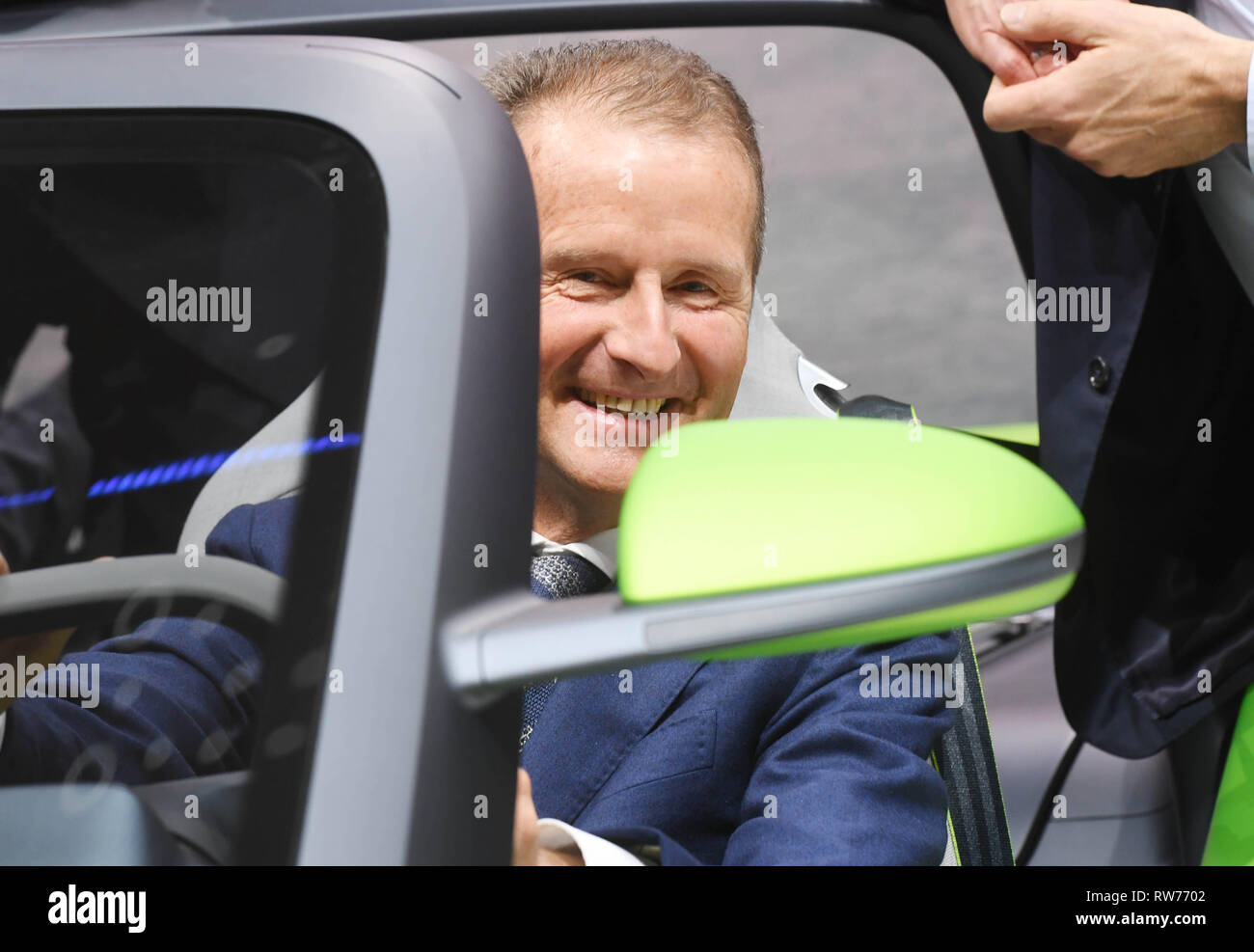 Genf, Switzerland. 05th Mar, 2019. Herbert Diess, CEO of Volkswagen (VW),  sits in the electric VW ID at the Geneva Motor Show on the first press day.  Buggy Concept. The 89th Geneva