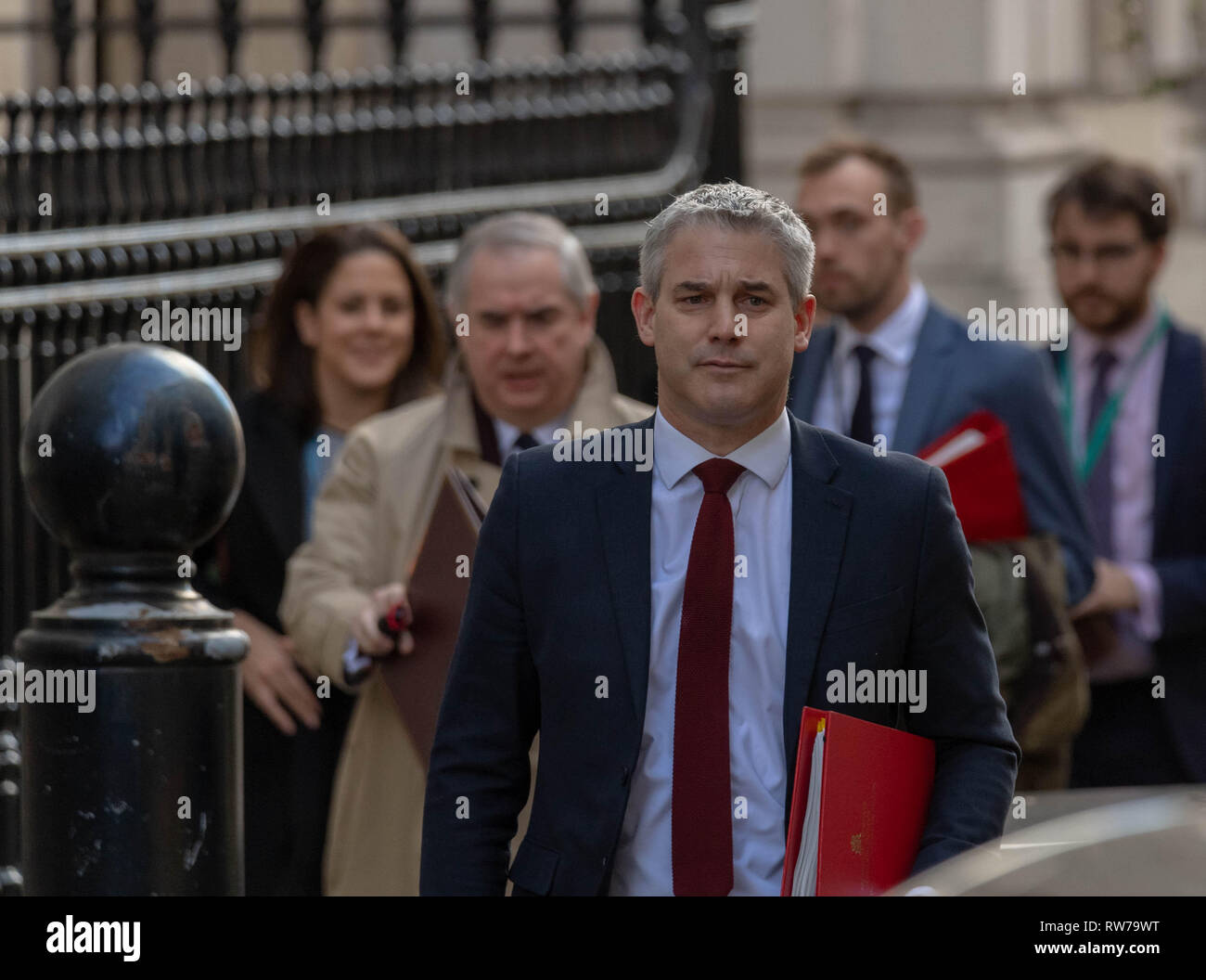 London, UK. 5th March 2019, Stephen Barclay, MP PC, Brexit Secretary and Geoffrey, Cox Attorney General leave Downing Street for the latest round of Brexit negotiations, London, UK. Credit: Ian Davidson/Alamy Live News Stock Photo