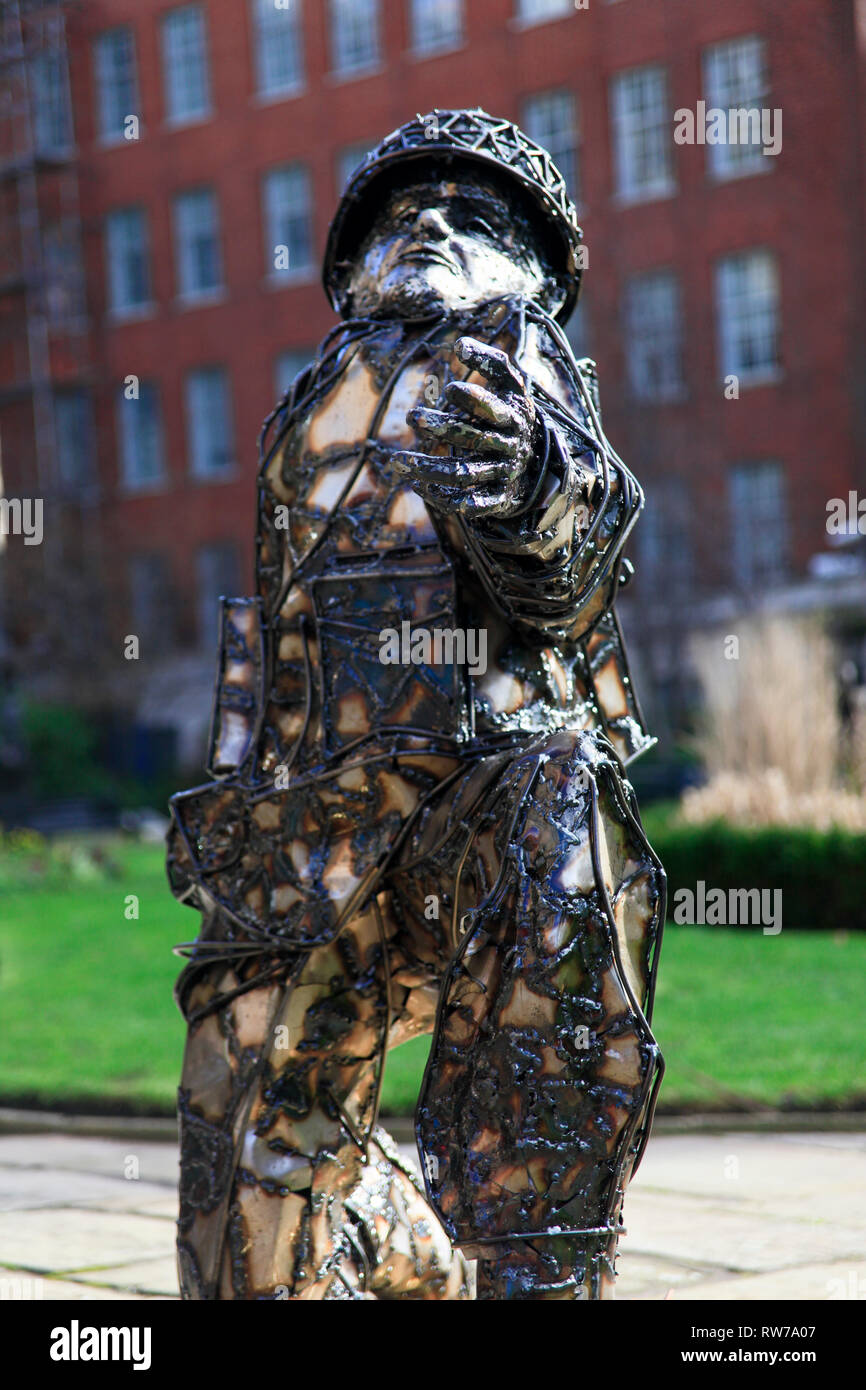 Liverpool, UK. 5 March 2019. A sculpture by artist Alfie Bradley incorporating more than 4,000 replica bullets has been unveiled in the grounds of Liverpool Parish Church ahead of the 75th anniversary of D-Day. 'Soldiers of Sacrifice' represents Denham Brotheridge, believed to be the first Allied soldier to be killed by enemy action on D-Day in June 1944. The sculpture is due to go on a tour of England and Normandy before reaching its permanent home in Portsmouth. The soldier is crouched down as if to throw a grenade, but instead he is releasing a dove of peace. Premos/Alamy Live News Stock Photo