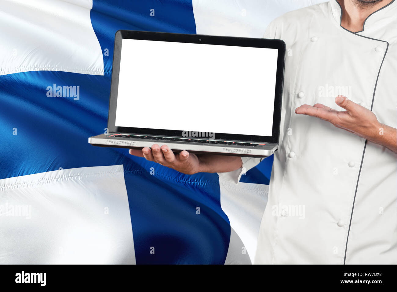 Finnish Chef holding laptop with blank screen on Finland flag