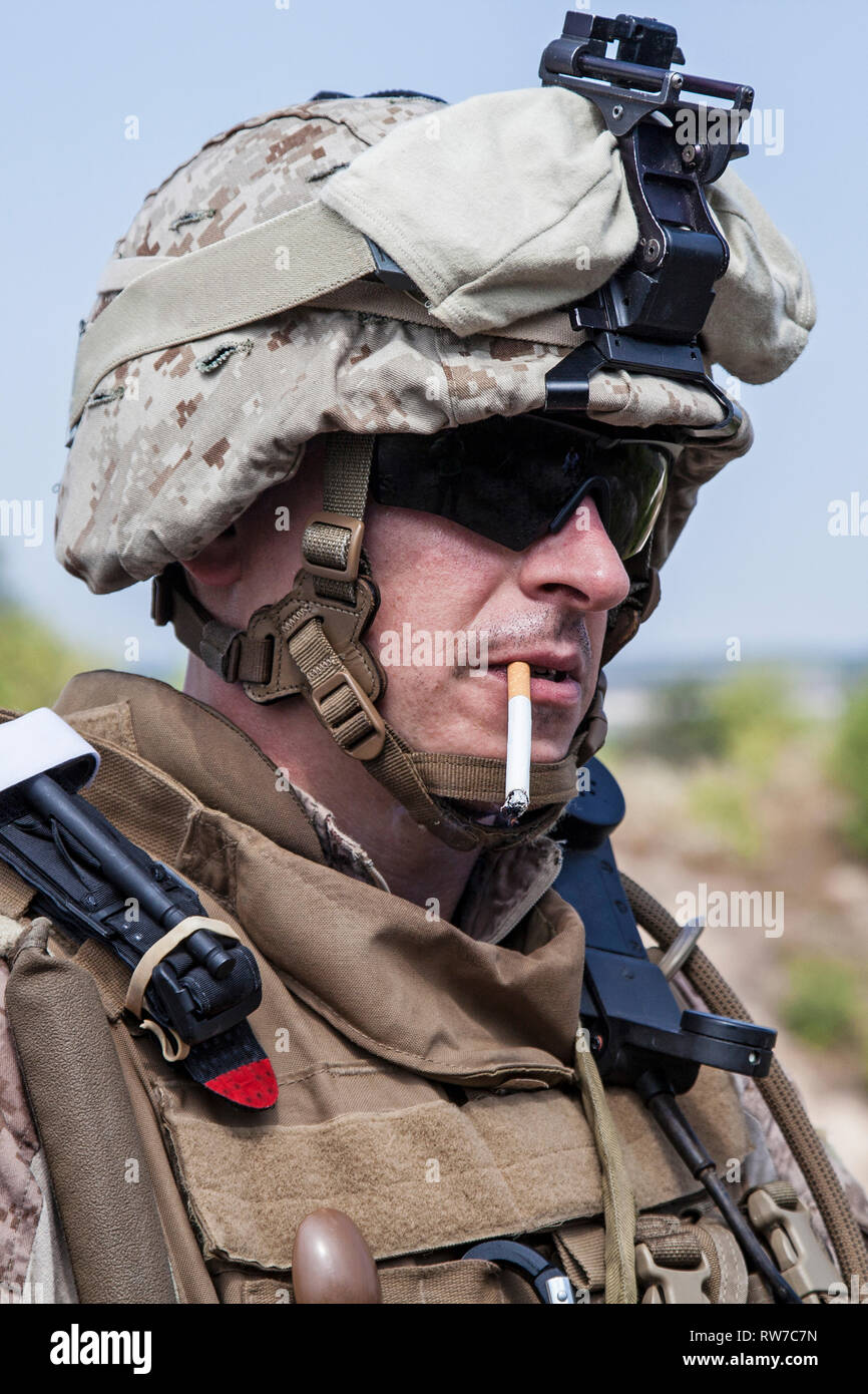 can you smoke cigarettes in the marines U.S. Marine smoking a cigarette, half-turned to the camera Stock Photo