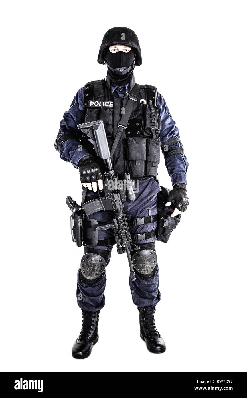 Special weapons and tactics (SWAT) team officer with his gun