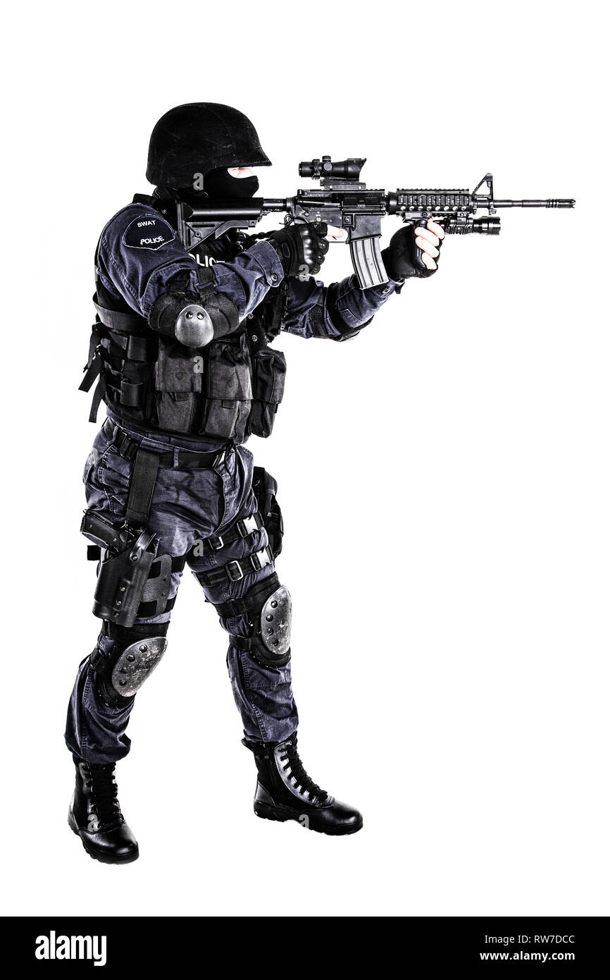 Special weapons and tactics (SWAT) team officer with his gun Stock
