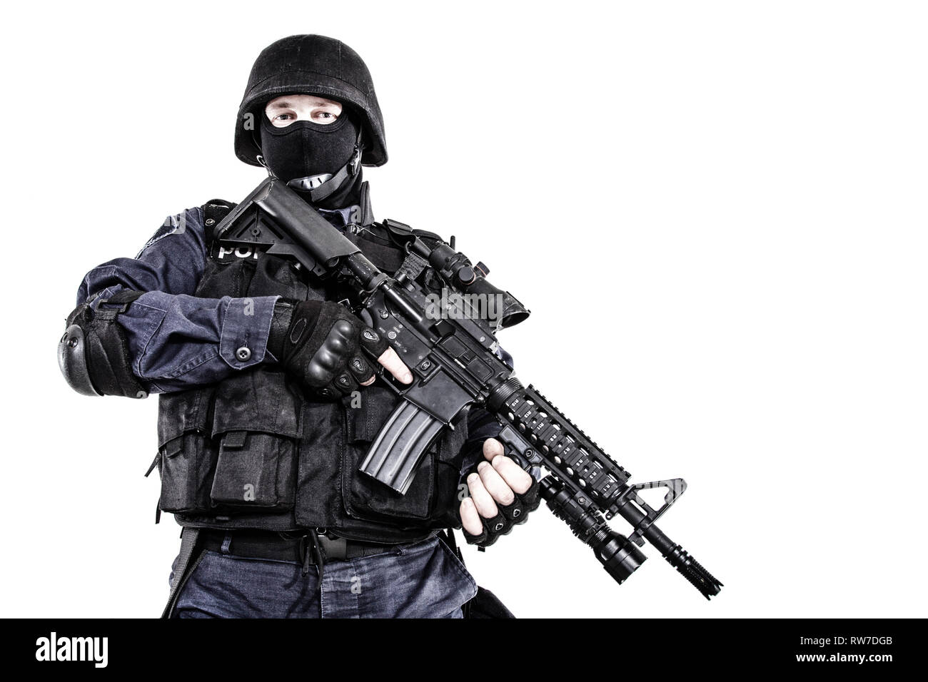 Special weapons and tactics (SWAT) team officer with his gun