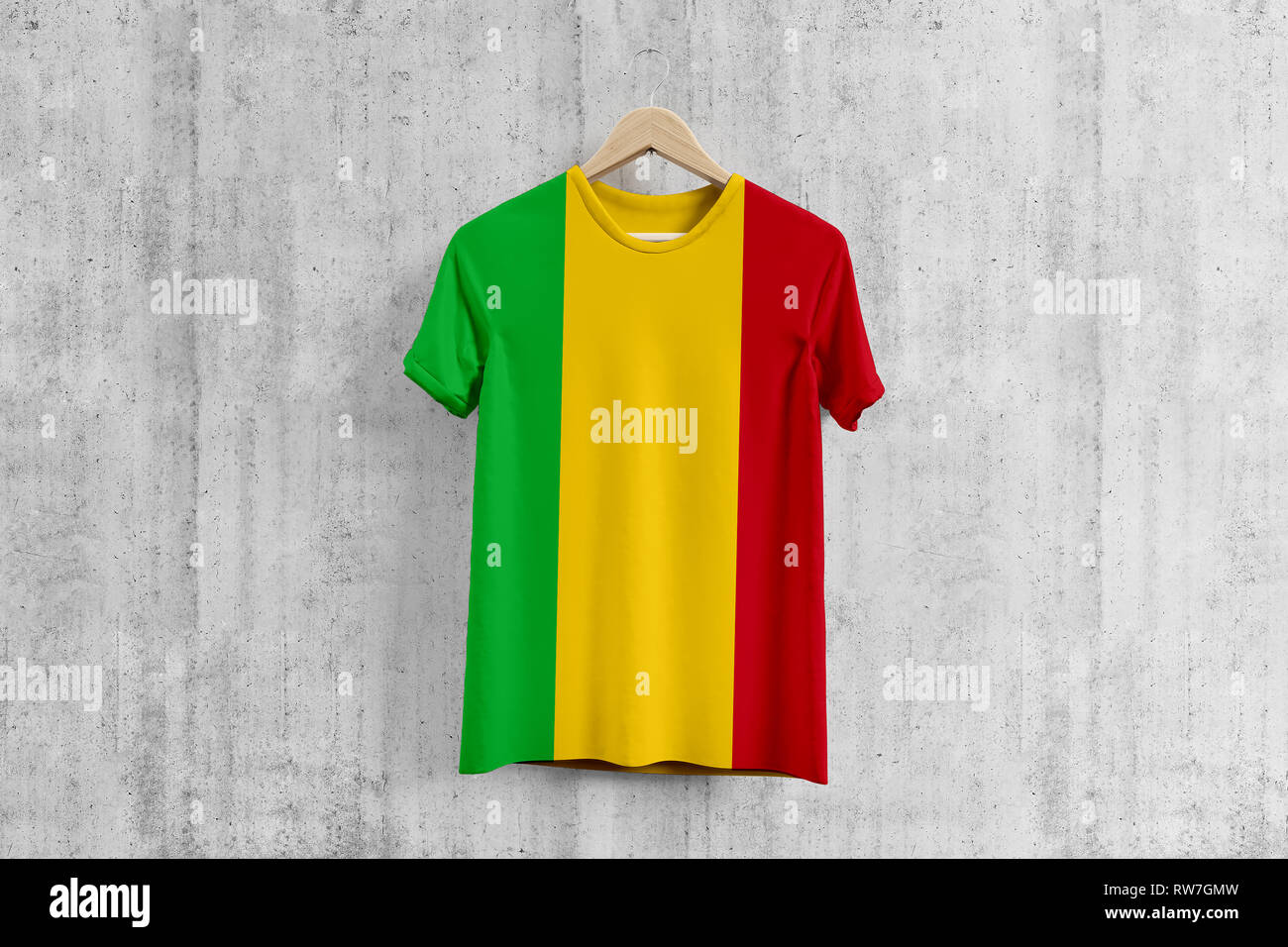 Mali flag T-shirt on hanger, Malian team uniform design idea for garment  production. National wear Stock Photo - Alamy