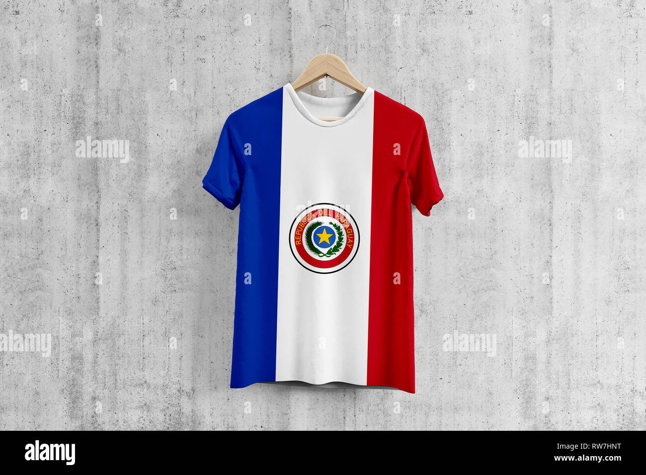 Paraguay flag T-shirt on hanger, Paraguayan team uniform design idea for  garment production. National wear Stock Photo - Alamy