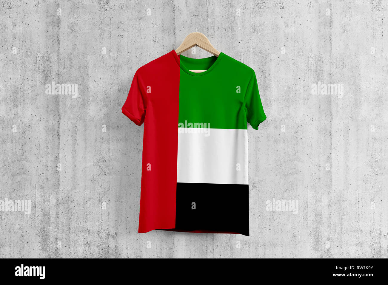 United Arab Emirates flag T-shirt on hanger, UAE team uniform design idea  for garment production. National wear Stock Photo - Alamy