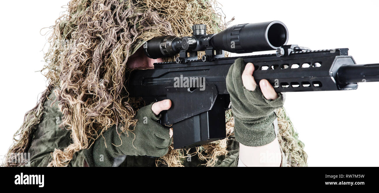 Camouflaged woman sniper in ghillie suit posing with rifle in foggy night.  Special Weapons and Woman Concept Stock Photo - Alamy