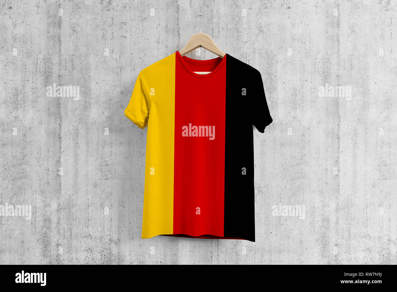 Germany flag T-shirt on hanger, German team uniform design idea for garment  production. National wear. 3D Rendering Stock Photo - Alamy