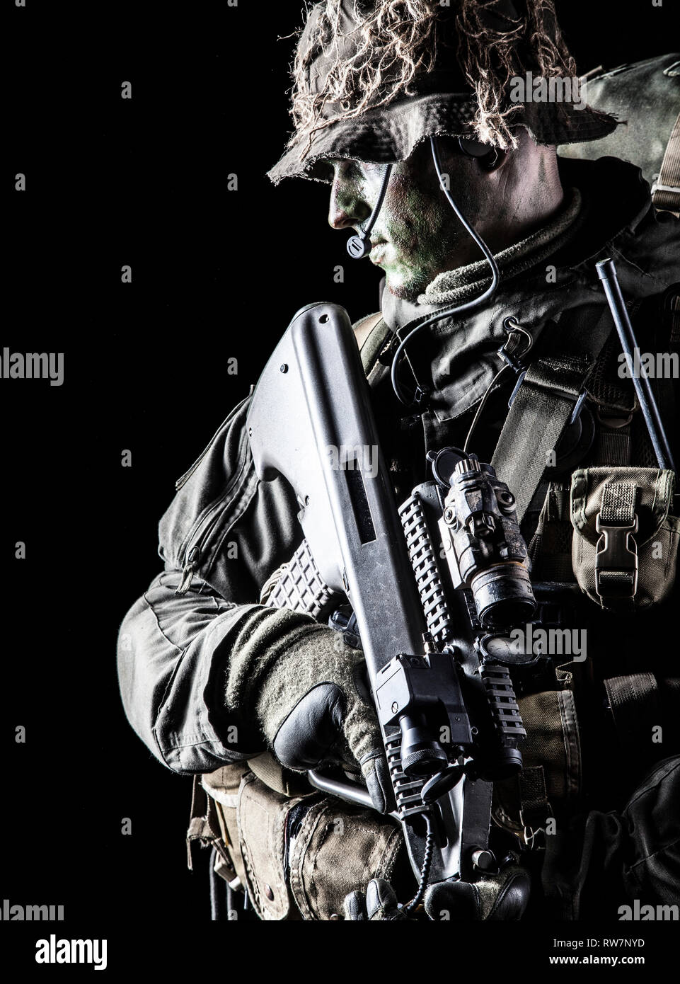 Jagdkommando soldier of the Austrian special forces with rifle on dark ...