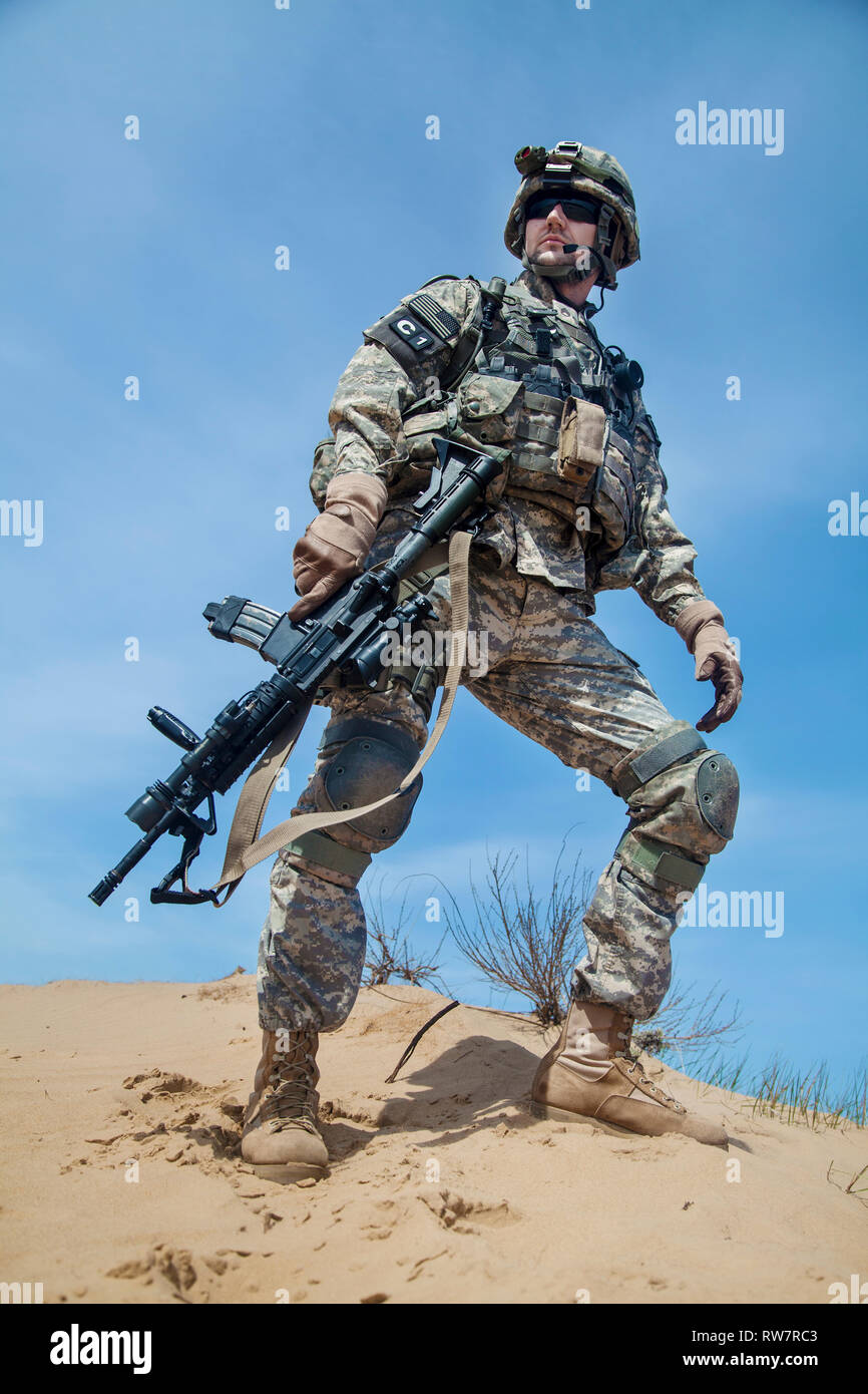 Low angle view of United States airborne infantry man with gun. Stock Photo