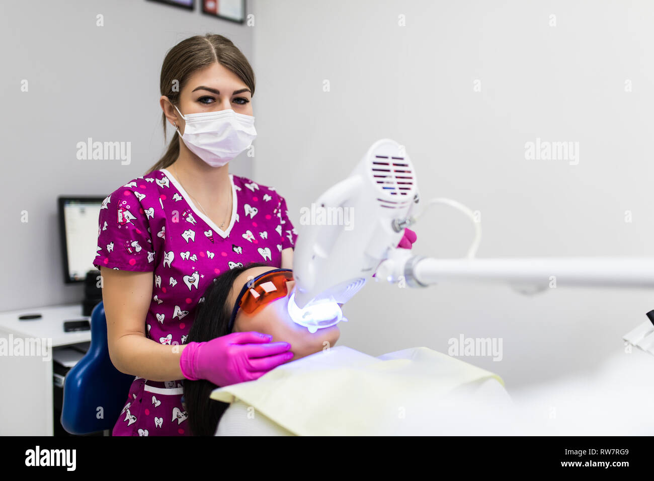 Teeth whitening blue light close up hires stock photography and images