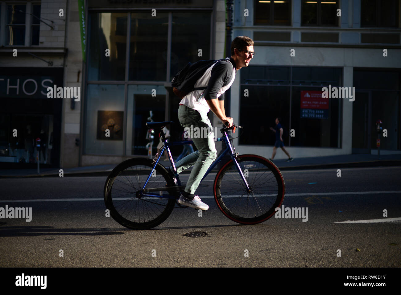 Bicycle rider in steep street of San Francisco Stock Photo - Alamy