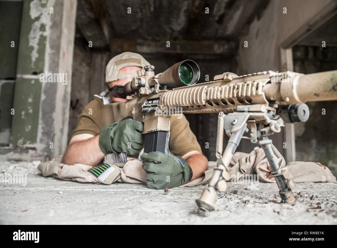 Navy Seal sniper with rifle in action Stock Photo - Alamy
