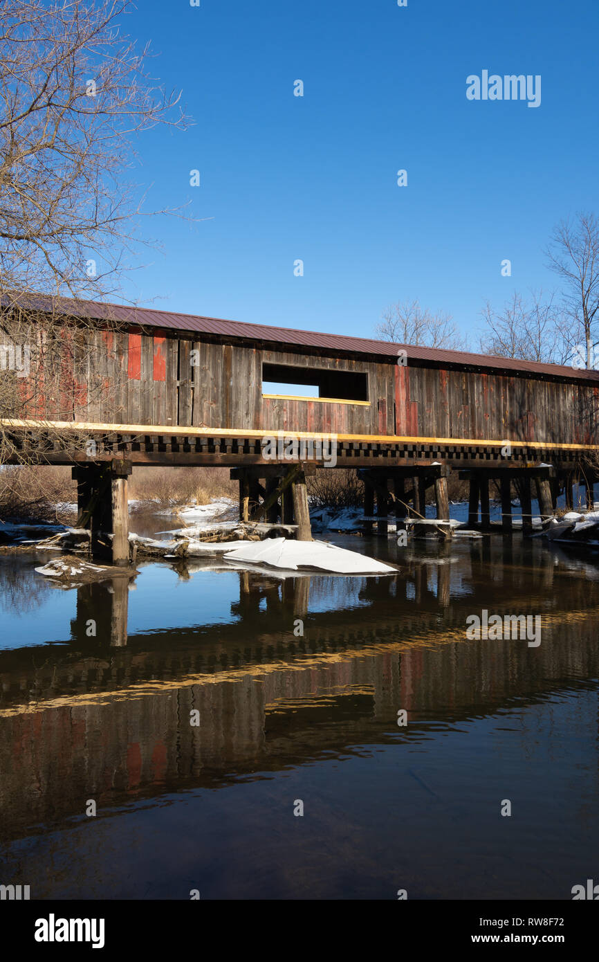 Covered bridge over Sugar Creek in Decatur, Wisconsin, USA Stock Photo