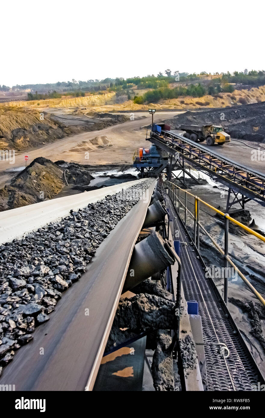 Black coal on a conveyor belt hires stock photography and images Alamy