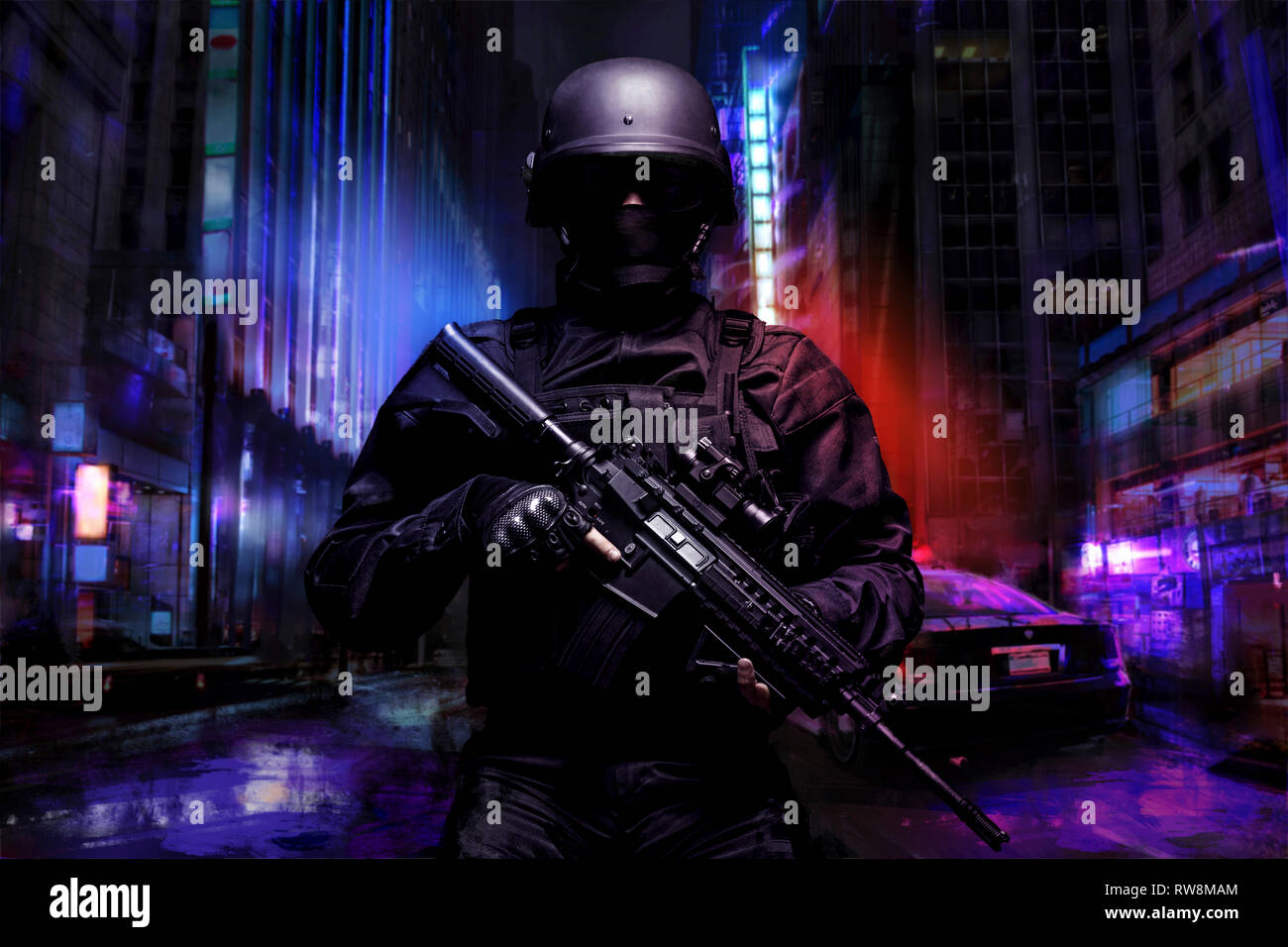 Spec ops police officer SWAT in black uniform on the street. Stock Photo