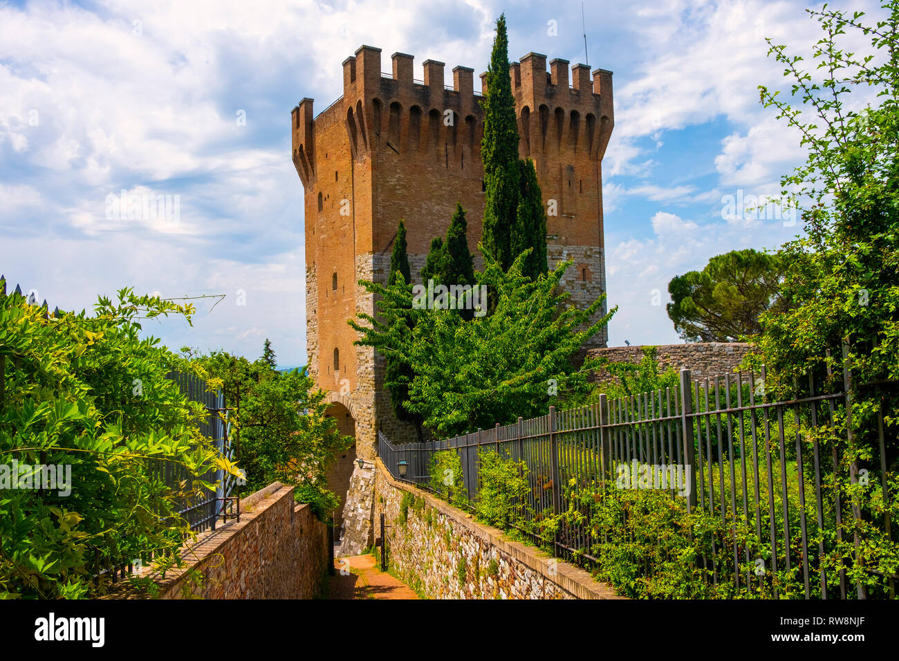 Perugia, Umbria / Italy - 2018/05/28: Stone tower and keep of St. Angelo Gate - Cassero di Porta Sant’Angelo - at the St. Michel Archangel Church in t Stock Photo