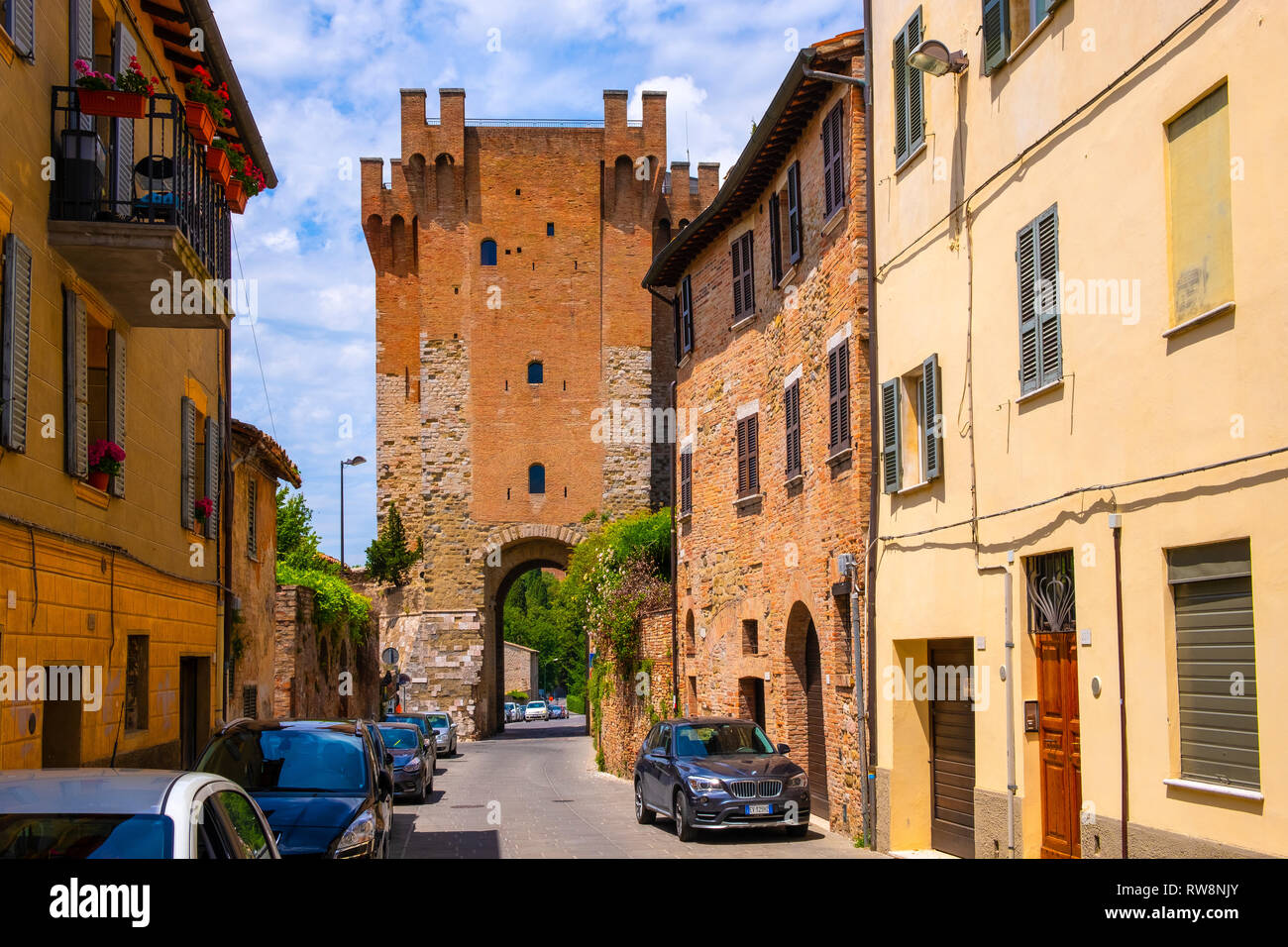 Perugia, Umbria / Italy - 2018/05/28: Stone tower and keep of St. Angelo Gate - Cassero di Porta Sant’Angelo - at the St. Michel Archangel Church in t Stock Photo