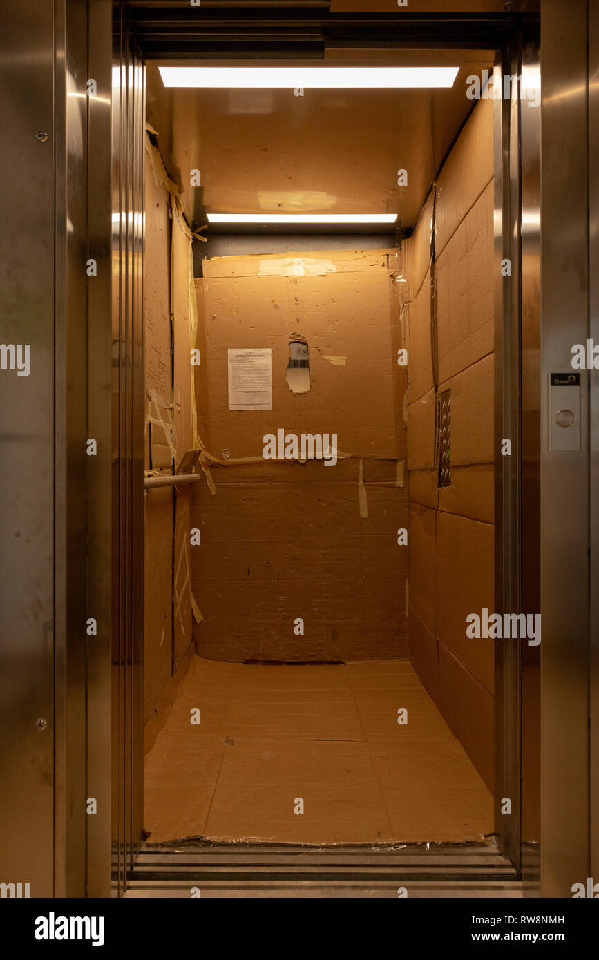 Cardboard wrapped elevator hires stock photography and images Alamy