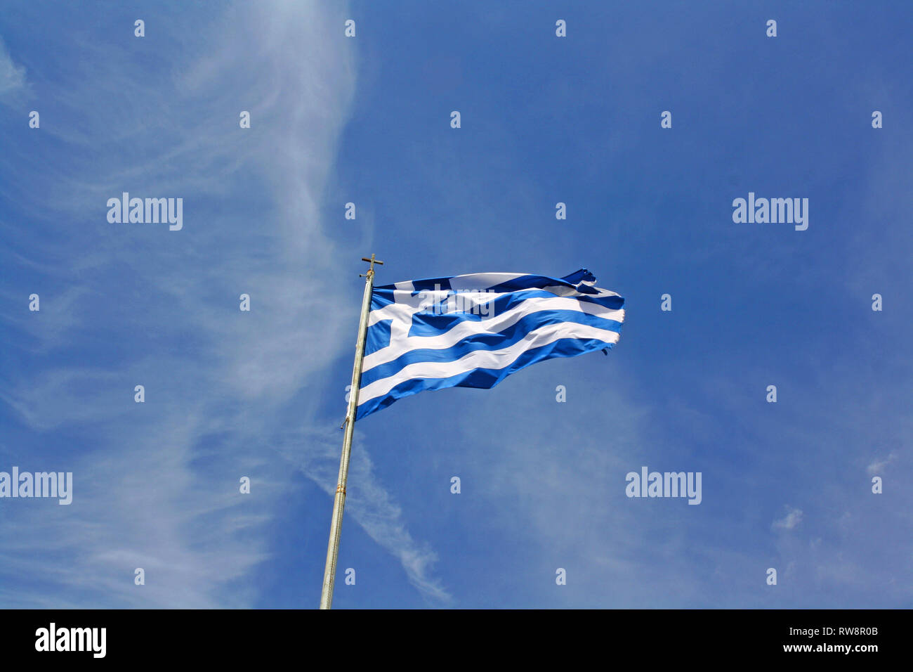 Greece national flag is waving in front of blue sky Stock Photo