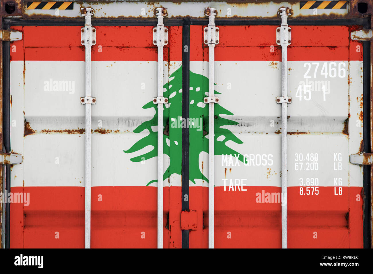 Closeup of the container with the national flag of Lebanon. The concept of Lebanon export