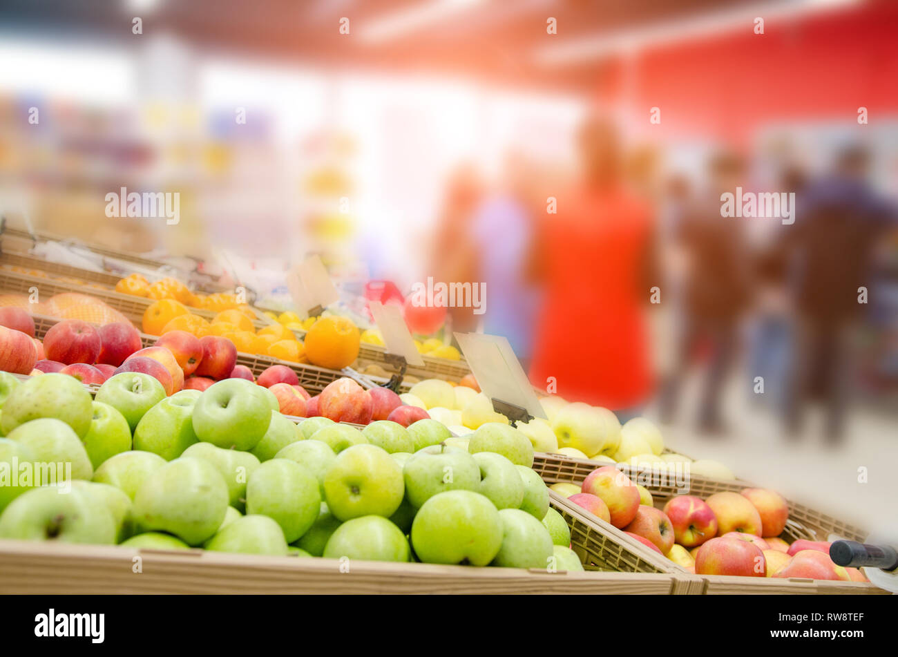 Blur market background with bokeh. Fresh fruits on shelf. Business concept Stock Photo Alamy
