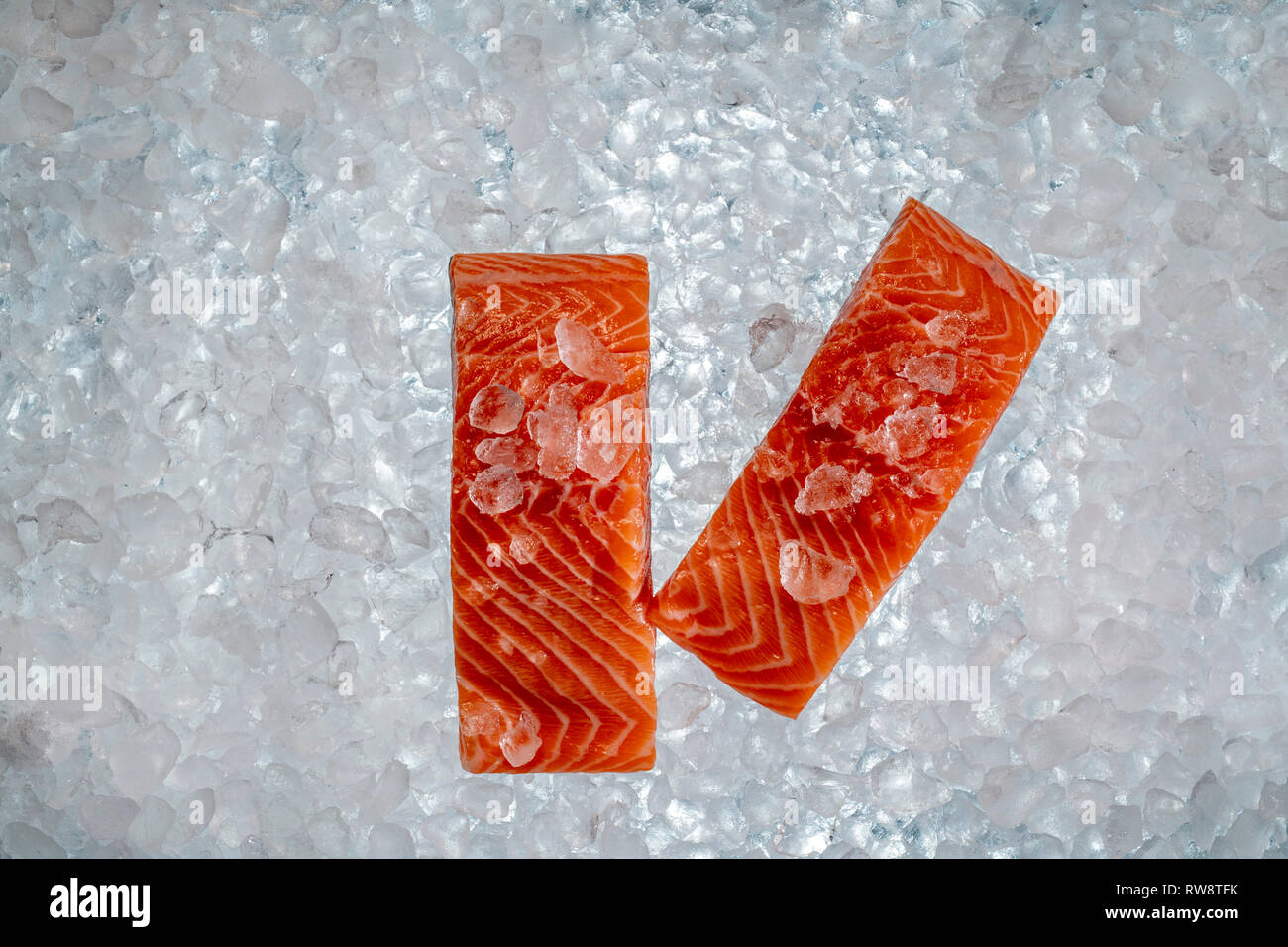 salmon on ice  as a background Stock Photo