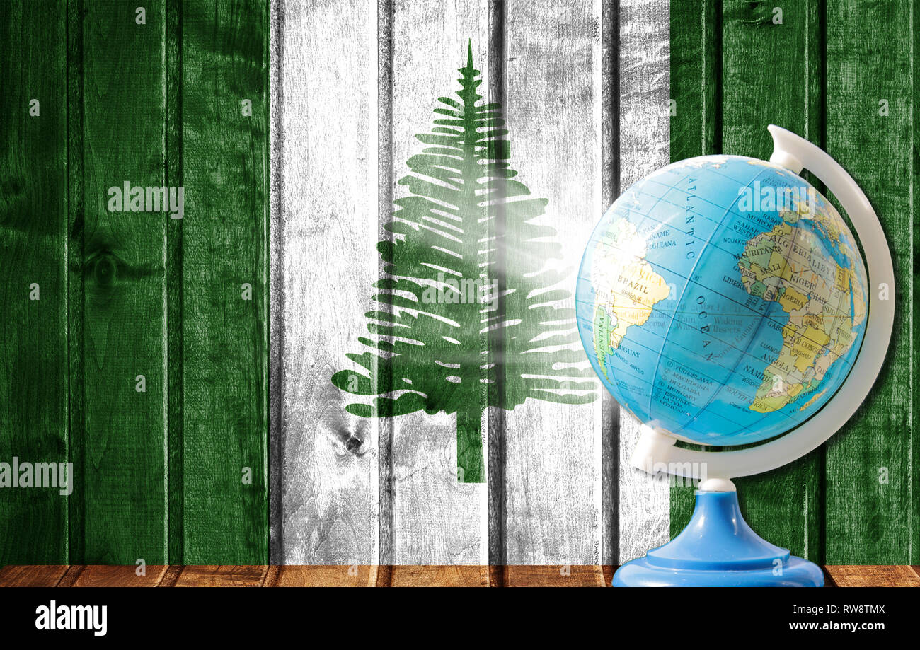 Globe With A World Map On A Wooden Background With The Image Of The Flag Of Norfolk Island The Concept Of Travel And Leisure Abroad Stock Photo Alamy