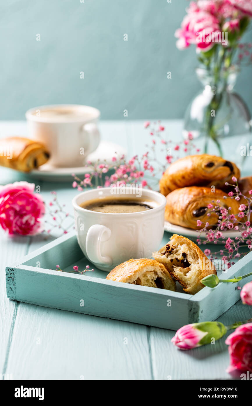Carnation Break Holiday break with cup of coffee, mini fresh croissants chocolate bun ...