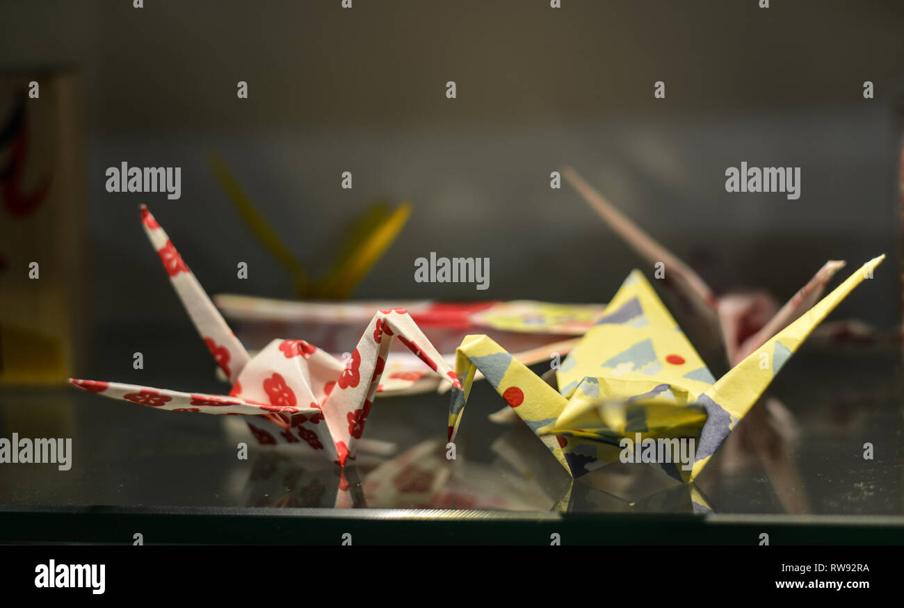 Origami birds for decorations at house. Origami is the art of paper