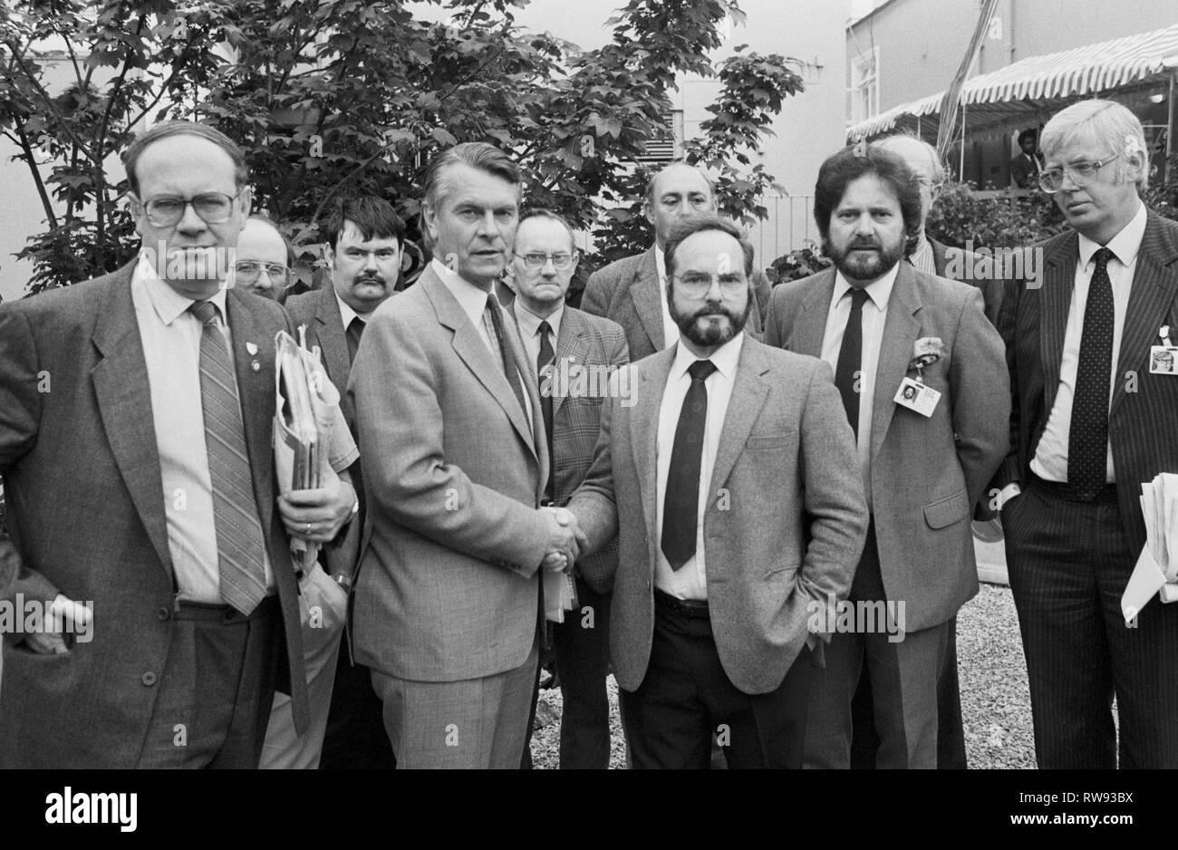 SDP leader Dr David Owen shakes hands with Bill Goffin, chairman of the Industrial Trades Union Devonport, who headed a delegation workers from Devonport and Rosyth dockyards at the SDP conference in Torquay. Stock Photo