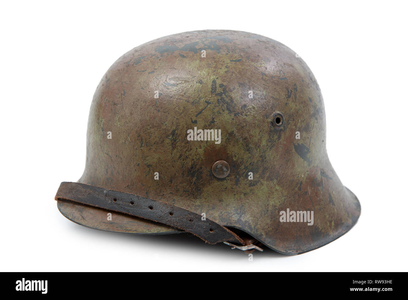 German World War Two (Stahlhelm M1942) military helmet, battle of  Normandy 1944 Stock Photo