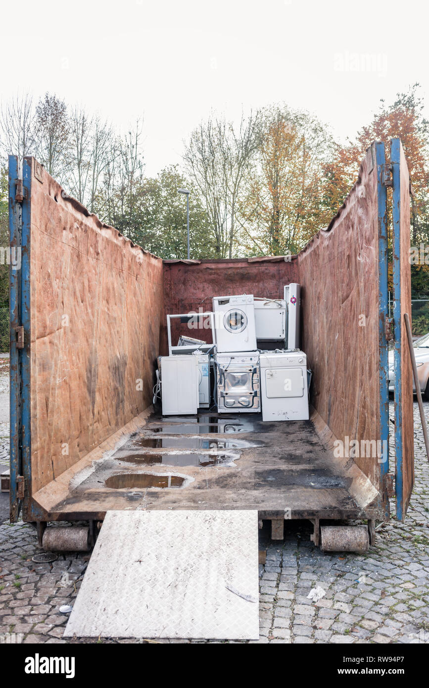 Old electrical appliances in container of recycling center  Stock Photo