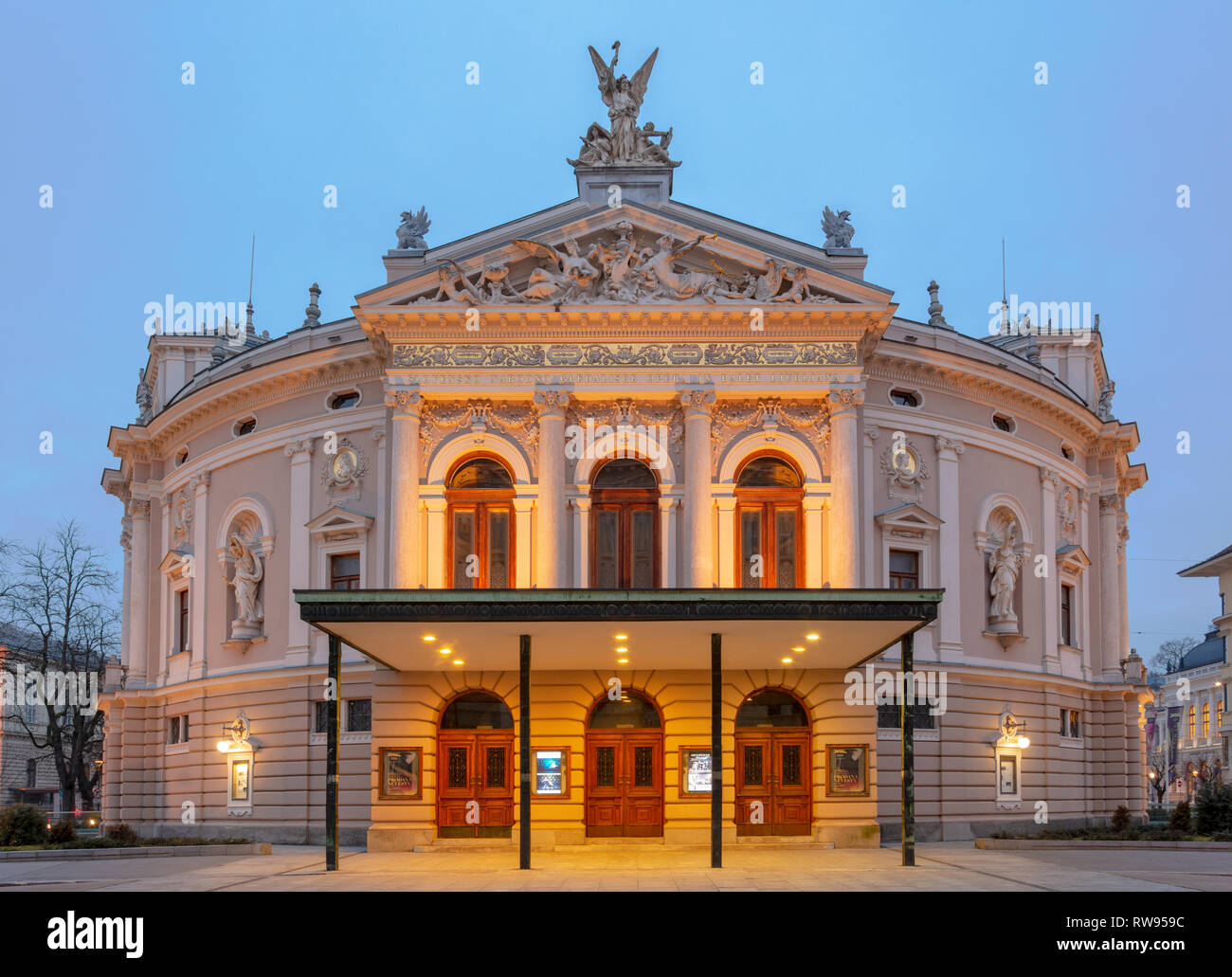 Ljubljana, Slovenia - February 8, 2019: Ljubljana opera house at dawn (in the early morning light when the street lights are still lit) Stock Photo