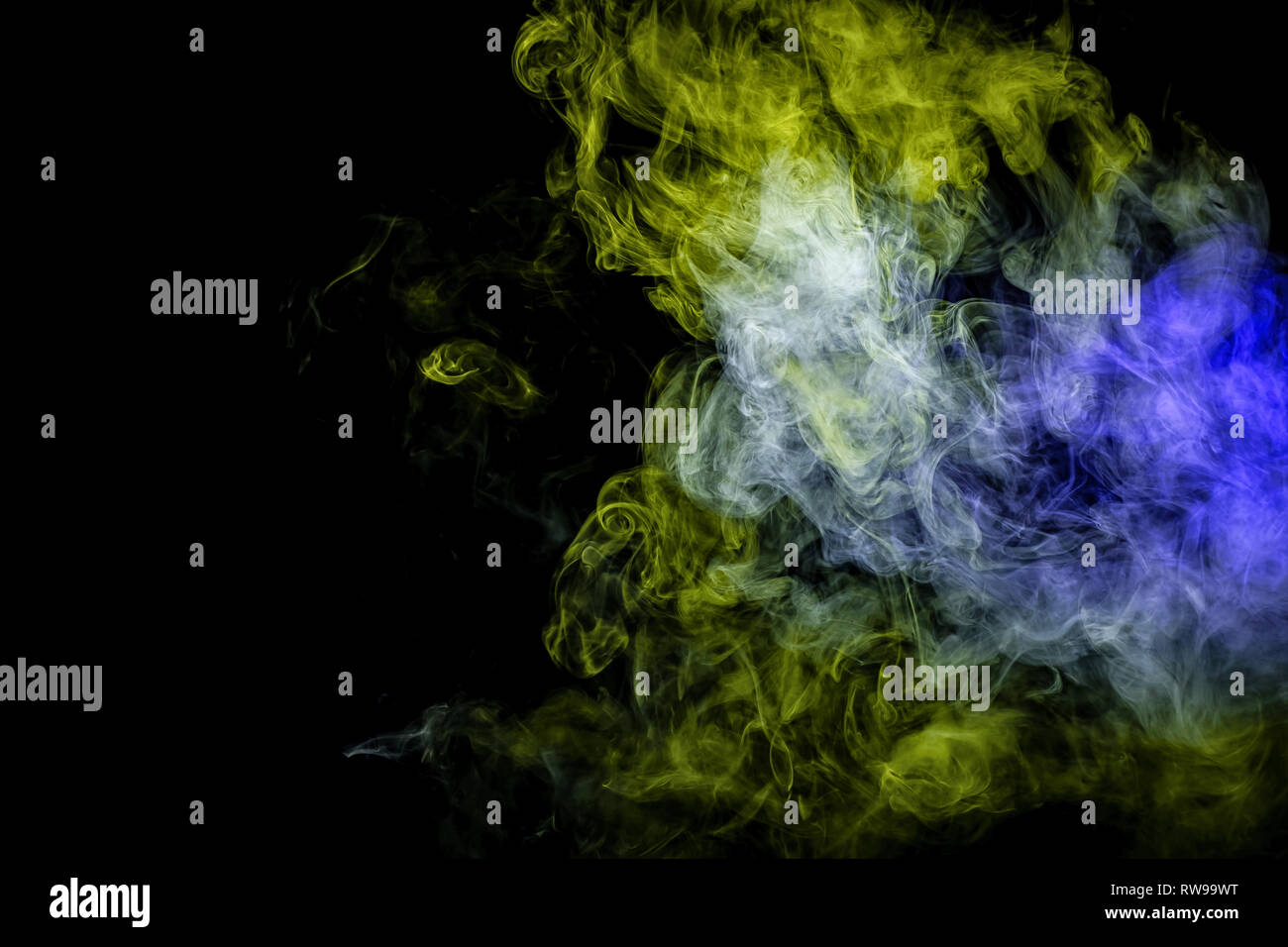 Abstract art blue and green colored smoke on black isolated background ...