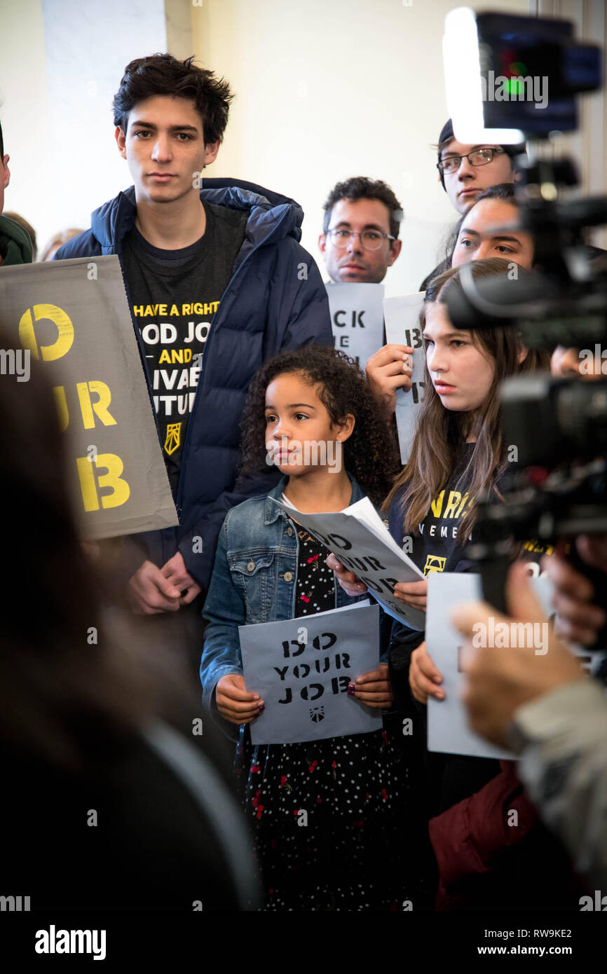 Washington, DC. USA. 12.10.18- Hundreds of young people occupy Representative offices to pressure the new Congress to support a committee for a Green New Deal. Stock Photo