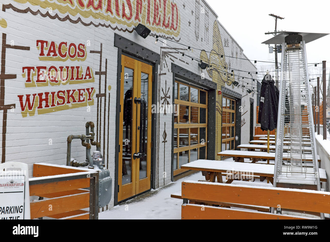Bakersfield Restaurant, one of many restaurants on trendy West 25th Street in Ohio City near downtown Cleveland, Ohio, during the wintertime. Stock Photo