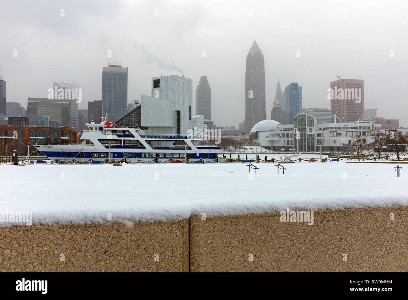 Winter in Cleveland, Ohio is notorious for its cold weather and snow which is especially prominent in the Northcoast Harbour District on Lake Erie. Stock Photo