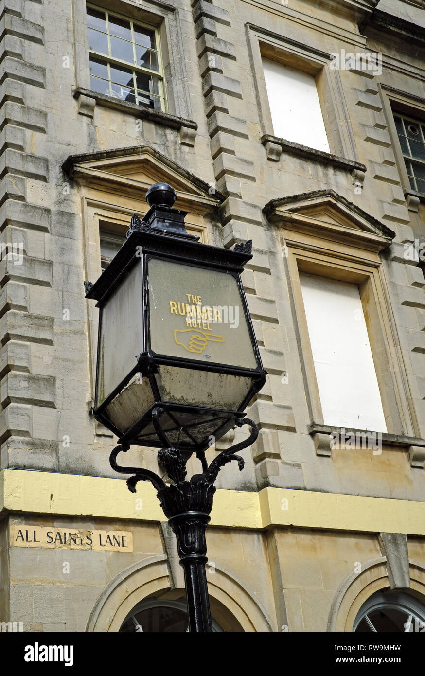 A sign in the form of a street lamp giving directions to the Rummer Hotel in Bristol, UK Stock Photo