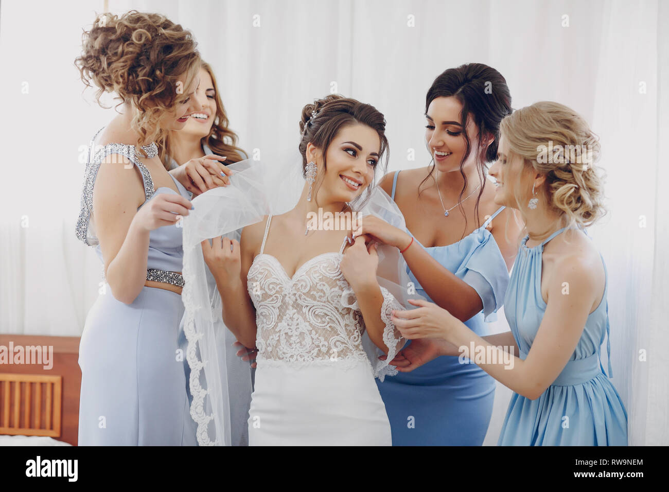 bride with bridesmaids Stock Photo