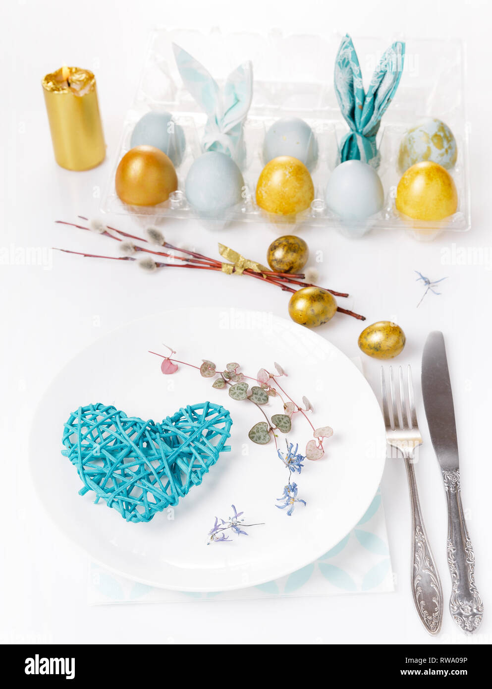 Easter background with Easter eggs and spring flowers. Top view with ...
